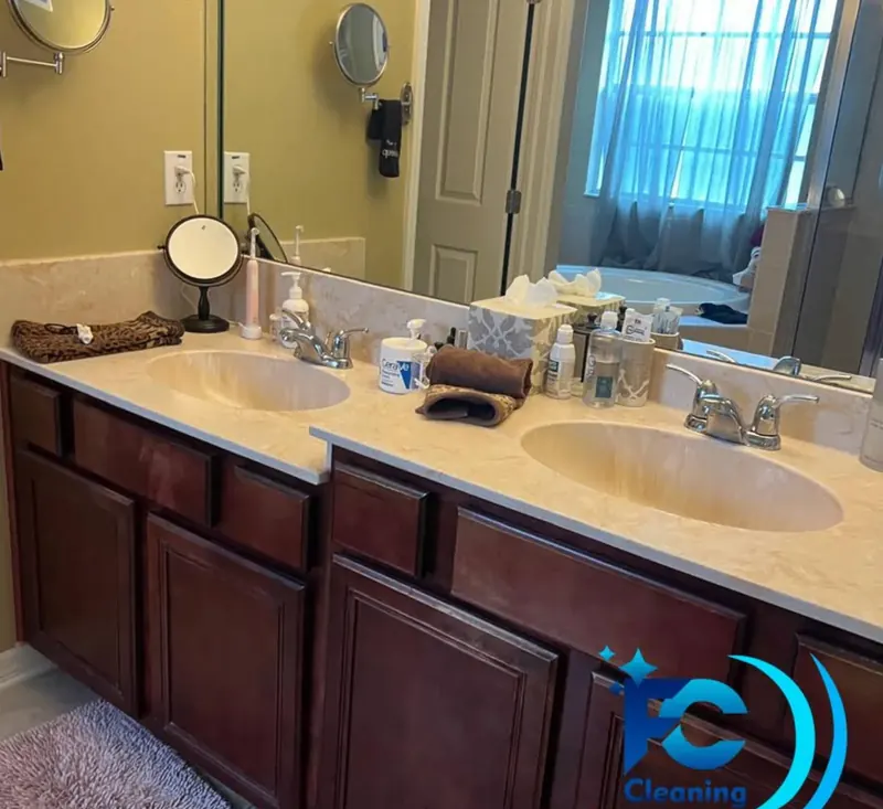 Spacious double vanity bathroom with marble countertop