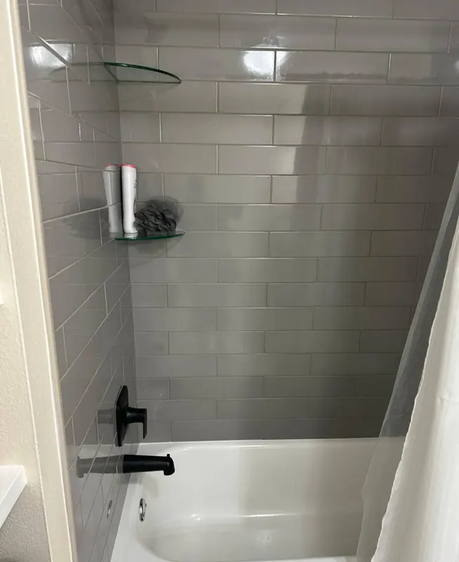 Sparkling subway tile tub surround